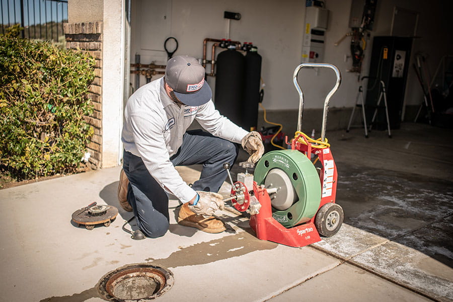 Commercial drain cleaning services in progress