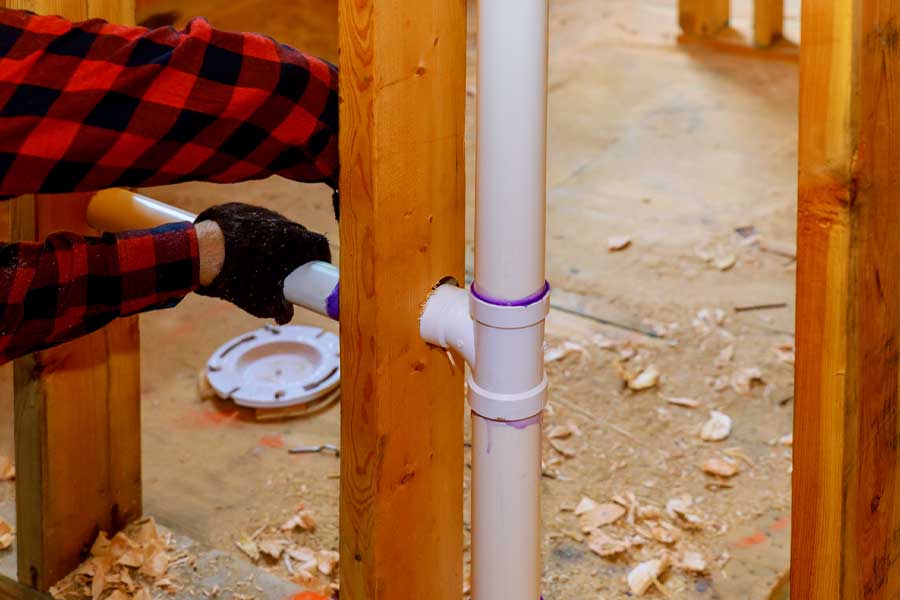 Plumber performing main water line replacement